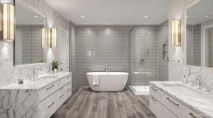 A modern luxury bathroom in New Westminster, BC, featuring a freestanding bathtub, a glass-enclosed shower, double vanity with marble countertops, and warm lighting.
