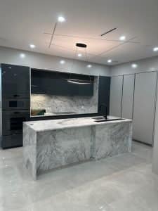 modern kitchen renovation with marble countertops and cabinets | GPS: 49.421263, -122.833360